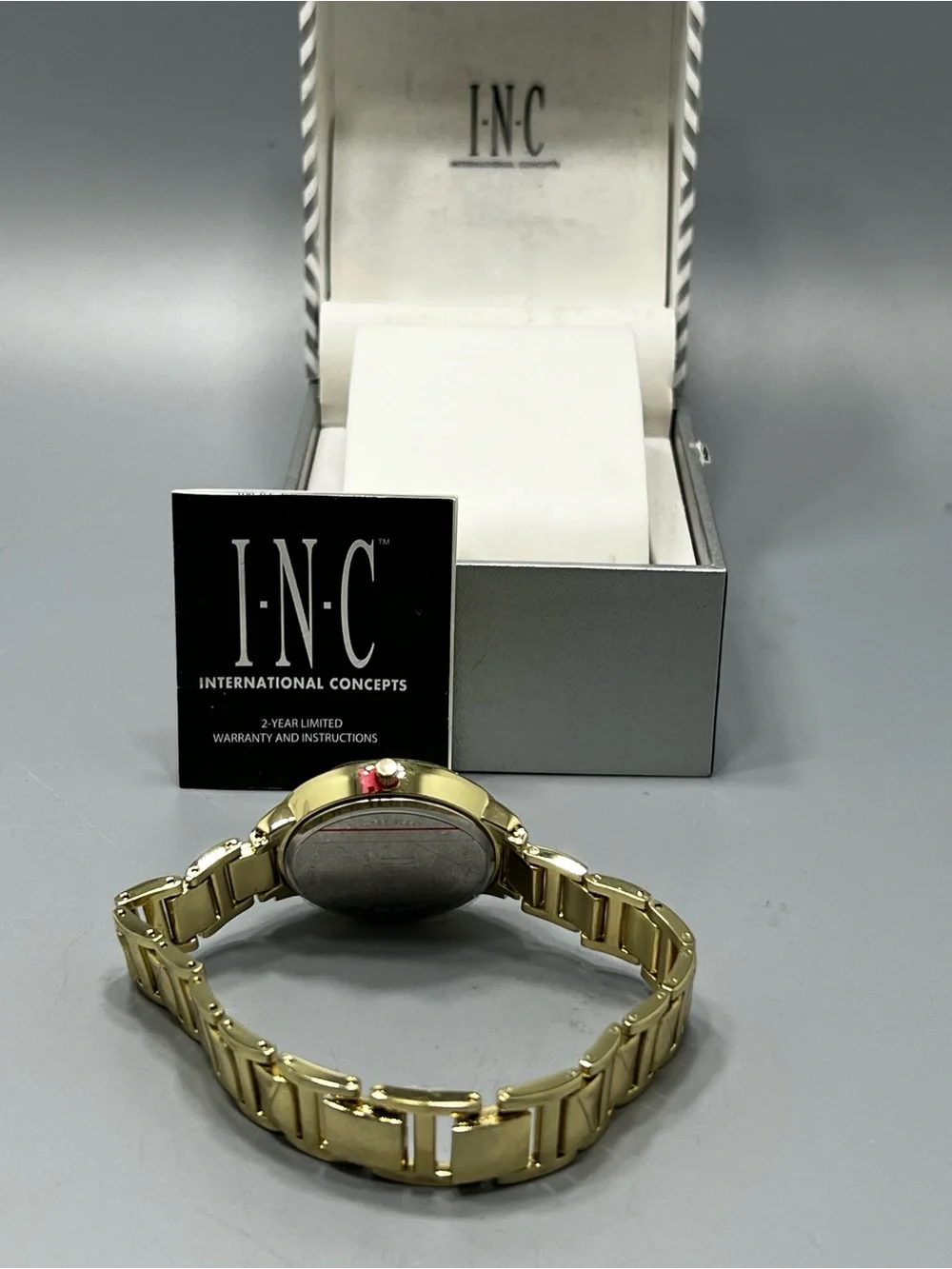 INC International Concepts sleek gold